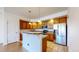 Modern kitchen with stainless steel appliances, granite countertops, and a convenient breakfast bar for casual dining at 11374 Xavier Dr # 202, Westminster, CO 80031