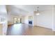 Spacious living room with hardwood floors, a fireplace, and a sliding door to the balcony at 11374 Xavier Dr # 202, Westminster, CO 80031