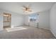 Spacious bedroom with ceiling fan, carpet, and window coverings at 23541 E Portland Way, Aurora, CO 80016