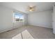 Bright bedroom with ceiling fan and window coverings at 23541 E Portland Way, Aurora, CO 80016