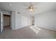 Large bedroom with double door closet and carpet flooring at 23541 E Portland Way, Aurora, CO 80016