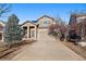 Two-story house with a driveway and landscaping at 23541 E Portland Way, Aurora, CO 80016