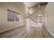 Bright living room with hardwood floors and high ceilings at 23541 E Portland Way, Aurora, CO 80016