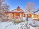 Cozy backyard patio with pergola, brick fireplace and storage shed at 2066 S Rifle St, Aurora, CO 80013