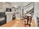 Bright kitchen featuring granite countertops and a dining area at 2066 S Rifle St, Aurora, CO 80013