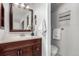 Bathroom featuring a large vanity mirror, and a small plant at 1745 S Kline Way, Lakewood, CO 80232
