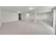 Large basement with neutral carpet and recessed lighting at 10369 E Red Mtn, Littleton, CO 80127