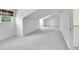 Empty bedroom with neutral carpet, one window, and interesting ceiling angles at 10369 E Red Mtn, Littleton, CO 80127