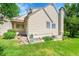 A beautiful yard with landscaping surrounding the home's exterior at 10369 E Red Mtn, Littleton, CO 80127