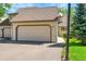 Attached two-car garage and driveway of house at 10262 at 10369 E Red Mtn, Littleton, CO 80127