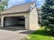 Attached garage offers ample storage space and convenience, complemented by a well-maintained exterior at 10369 E Red Mtn, Littleton, CO 80127