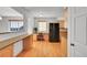 Bright kitchen with modern appliances, breakfast bar, and abundant counter space at 10369 E Red Mtn, Littleton, CO 80127