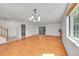 Bright living room with hardwood floors, fireplace, and access to the backyard at 10369 E Red Mtn, Littleton, CO 80127