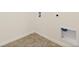 Unfinished utility room with tile flooring, laundry hookups and white walls at 4107 Marble Dr, Mead, CO 80504