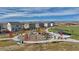 Community playground featuring modern equipment, picnic area, and views of the Rocky Mountains at 4107 Marble Dr, Mead, CO 80504