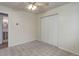 Bedroom with standard closet and ceiling fan located next to the ensuite bath at 9743 W 67Th Pl, Arvada, CO 80004