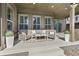 Relaxing outdoor patio with comfortable seating, neutral colors, and ample space for entertaining at 21972 E Allenspark Dr, Aurora, CO 80016