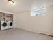 Spacious laundry room area features washer and dryer hookups at 2724 S Ames Way, Denver, CO 80227