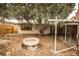 Backyard featuring a mature tree with a concrete bird bath at 4263 S Elati St, Englewood, CO 80110