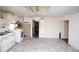 Spacious kitchen with vintage appliances and ample room for renovation at 4263 S Elati St, Englewood, CO 80110