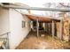 Covered patio featuring support beams and a natural color palette at 4263 S Elati St, Englewood, CO 80110