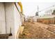 Narrow side yard leading to backyard area at 4263 S Elati St, Englewood, CO 80110