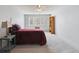 Bedroom with bright window, a ceiling fan, neutral carpeting and ample closet space at 615 S Alton Way # 7A, Denver, CO 80247