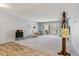 Spacious living room featuring large sliding glass doors and neutral carpeting at 615 S Alton Way # 7A, Denver, CO 80247