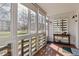 Inviting sunroom with ample natural light, multiple windows, and a neutral color scheme at 615 S Alton Way # 7A, Denver, CO 80247