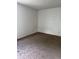 Bedroom featuring neutral carpeting at 14425 E Albrook Dr, Denver, CO 80239