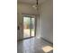 Tile dining area with sliding door access to the outdoors at 14425 E Albrook Dr, Denver, CO 80239