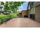 Back patio with a view of the beautiful, well-maintained backyard in the neighborhood at 7238 W Cedar Cir, Lakewood, CO 80226