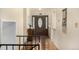 Grand entryway with hardwood floors, stylish front door, and staircase at 7238 W Cedar Cir, Lakewood, CO 80226