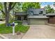 Charming two-story home with attached two car garage and manicured lawn at 7238 W Cedar Cir, Lakewood, CO 80226