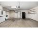 Well-maintained garage with storage cabinets and space for parking at 7238 W Cedar Cir, Lakewood, CO 80226