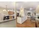Open-concept kitchen with stainless steel appliances and granite countertops at 7238 W Cedar Cir, Lakewood, CO 80226