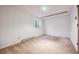 Large basement area with window provides a bright and open space at 8409 S Otis St, Littleton, CO 80128