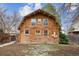 Exterior view of cozy log cabin home with unique design and charm at 8409 S Otis St, Littleton, CO 80128