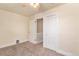 Bedroom featuring neutral colored walls and carpet with a ceiling fan at 723 31St St, Denver, CO 80205