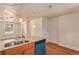 Functional kitchen with granite countertops and stainless steel sink. Lots of room for entertaining at 723 31St St, Denver, CO 80205