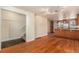 Spacious living room with stairs, hardwood floors, and open layout to the kitchen at 723 31St St, Denver, CO 80205