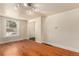 Cozy living room with hardwood floors, bright window, and neutral walls ready for personalization at 723 31St St, Denver, CO 80205