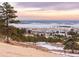 Beautiful horizon and landscape view with distant buildings and mountains at 53 Canyon Pines Dr, Golden, CO 80403