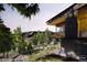Modern home with a balcony showcasing mountain views and lush trees at 53 Canyon Pines Dr, Golden, CO 80403
