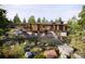 Stunning modern home with clean lines, large windows, and beautiful landscaping for a luxurious living experience at 53 Canyon Pines Dr, Golden, CO 80403