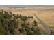 Picturesque landscape with distant buildings and roads on a sunny day at 53 Canyon Pines Dr, Golden, CO 80403