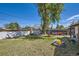 Lawn with a fire pit and patio furniture perfect for outdoor entertaining and relaxation at 5424 Saulsbury Ct, Arvada, CO 80002