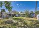 Spacious backyard featuring a lawn and fence, providing ample space and privacy at 5424 Saulsbury Ct, Arvada, CO 80002