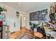 Bedroom featuring hardwood floors, ample space, and natural light at 5424 Saulsbury Ct, Arvada, CO 80002