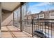 Outdoor balcony overlooking street with views of the neighborhood townhomes at 425 S Reed St, Lakewood, CO 80226